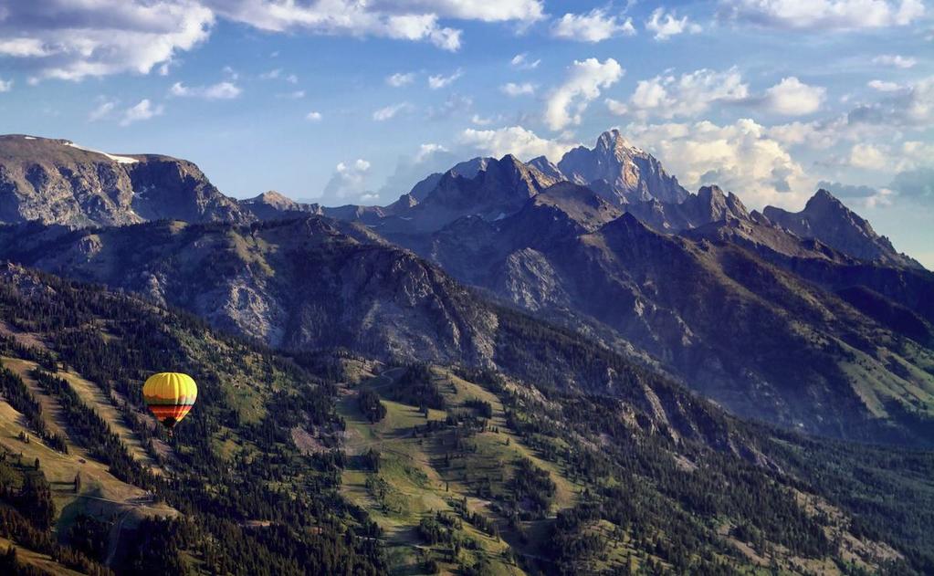 Soaring over 1,000 feet above the valley floor in total silence, enjoy 360 degree views of the Gros Ventre, Teton, Absaroka and Snake River mountain ranges from the comfort and safety of your group