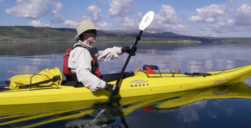 EXPLORING BY WATER KAYAKING AND CANOEING MAY - OCTOBER Paddling your own kayak or canoe across a glassy mountain lake can be one of the most rewarding methods of touring.