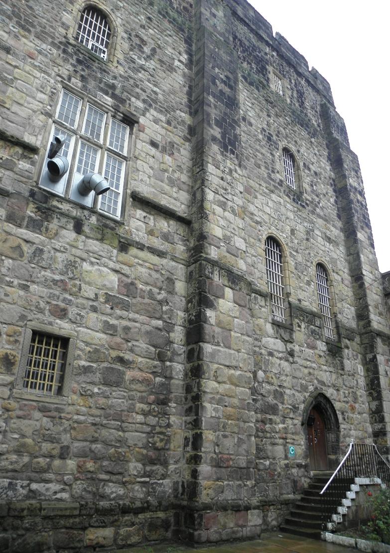 Lancaster Castle. The east façade of the keep. The north basement door at the top of the steps led to the chapel.