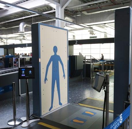 I will then stand in line and wait until the security person asks me to walk through the metal detector arch.