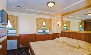 All cabins are outside facing with Standard staterooms on the Cabin Deck featuring porthole windows, Main and Promenade Deck cabins feature large picture windows, except for the Owner s suite located