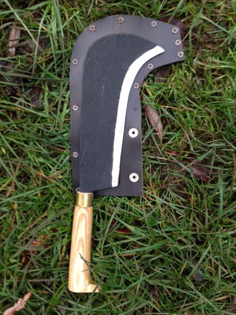 Tool Introduction for (Demonstrate fully) This is a bill hook This is the bill hook cover This is the handle, this is the blade This is the cutting edge Photo: OLME Ltd Always hold the billhook like