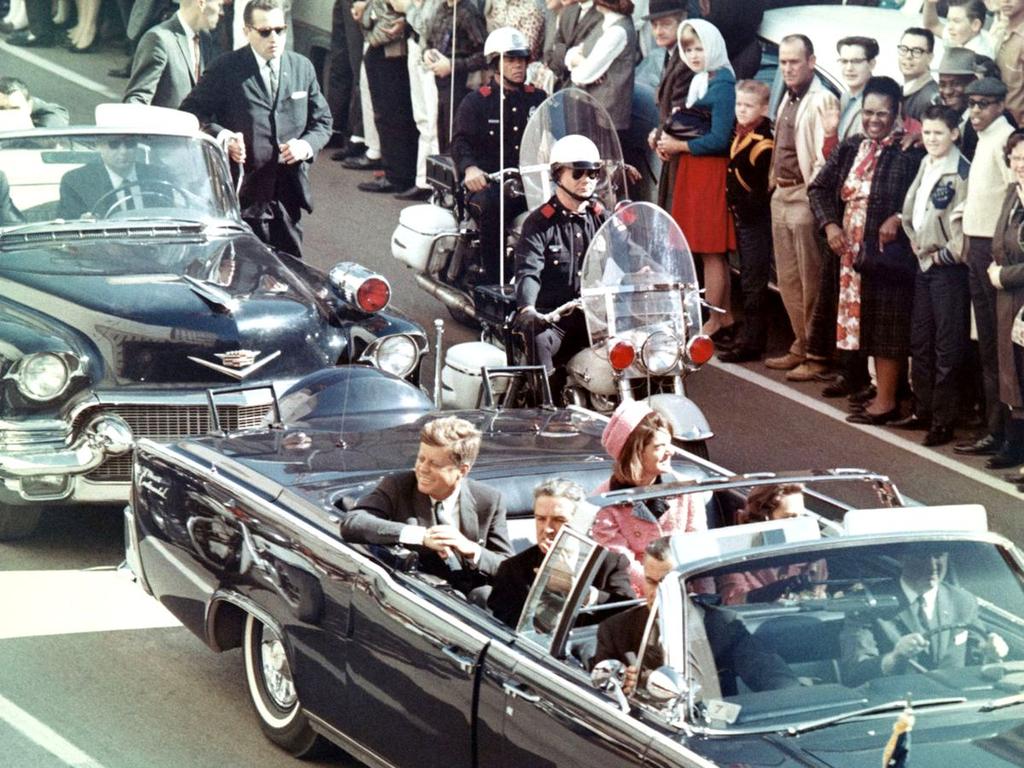 The assassination On November 22, 1963, JFK was assassinated while traveling through Dallas, Texas in an open top convertible At approximately 12:30 pm, Lee Harvey Oswald fired three shots, which
