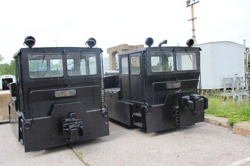 These two Plymouth locomotives were found sitting in a parking lot near Watson