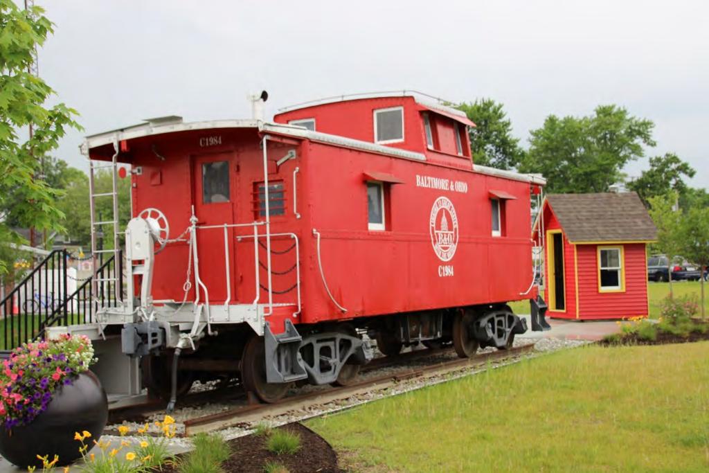 On display in downtown North Vernon, Indiana, next to the CSXT track, is this B&O caboose and watchmen shanty.