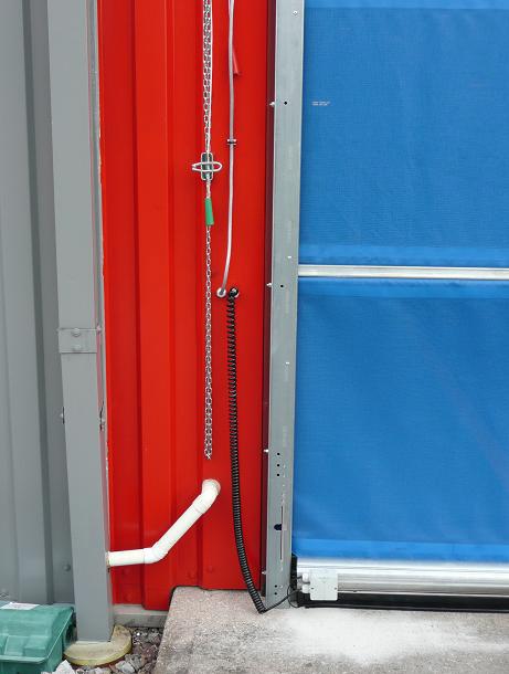 The door is made from heavy duty PVC coated polyester mesh panels reinforced with steel wind bars which run in vertical