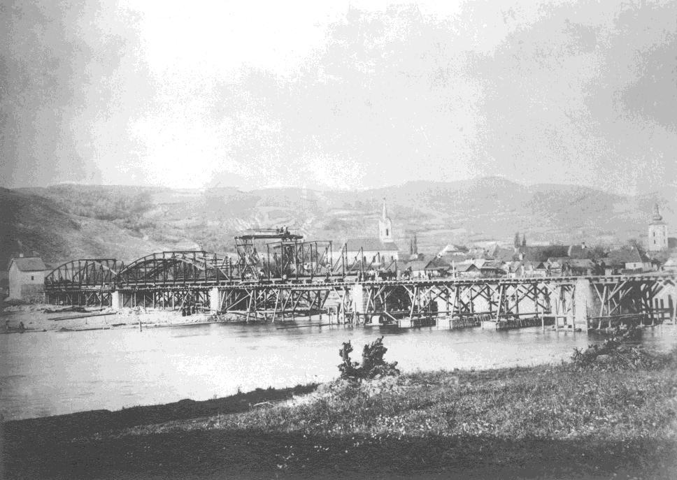 Our History The bridge over river Váh leading to