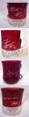 Lot # 83 - Set of 4 Ruby Glass Mugs: Ruby glass mug with clear glass handle and base. Inscribed in center "Mother" and on one side "Pan American 1901." Size: 3" x 2.75" diam.