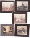 Estimate: $ 75 - $ 125 Lot # 96 - Set of 5 Photographs pasted on a type of paperboard: Small panoramic image that includes the Temple of Music, Electric Tower, Ethnology Building, and U.S. Government Buildings at night Size: 4.