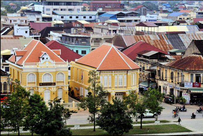 Spot beautiful French colonial architecture along the way and observe the busy morning rush in the streets and market.