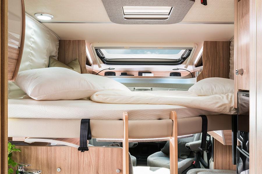 Room for the grandchildren The optionally available fold-down bed for the HYMER T-Class CL offers a generous sleeping surface and is
