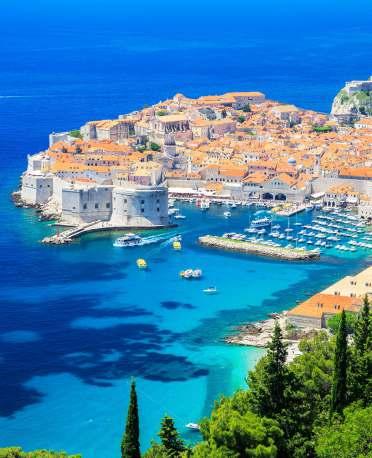CROATIAN ISLAND CRUISE YOUR TOUR DOSSIER Set sail along one of the most breathtakingly scenic coastlines in the world where rugged mountains cascade down into the crystalline waters.