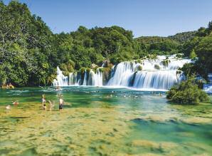 Krka National Park Trogir At this point the gorge is about 450 metres wide and our pathway winds across a series of incredibly scenic cascades (known locally as necklaces), interspaced with islands