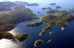An island and archipelago that like by a miracle escaped the blessings of civilization.