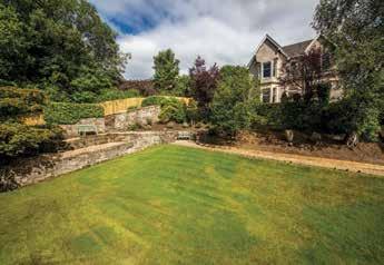 2 acres. This new house is beautifully finished in stone and has a low-level Sedum roof and with separate access to ensure the independence of both properties.