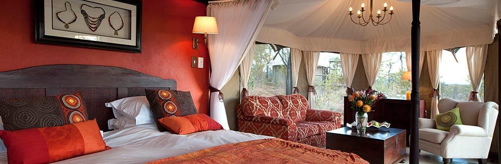 10 THE ELEPHANT CAMP 2 NIGHTS - VICTORIA FALLS, ZIMBABWE Situated on a private concession within and bounded by the Masuwe River and the Zambezi Gorges, the