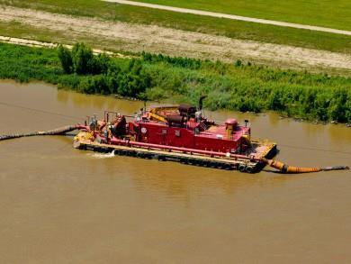 Use and Efficiency of the Dredge Manteo