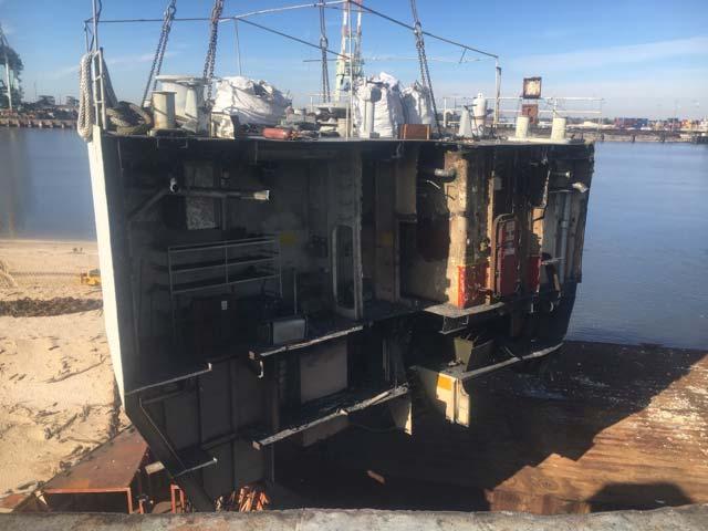days after the crane s return, the milestone of completing removal of all asbestos from the ship had been achieved and steel removal re recommenced.