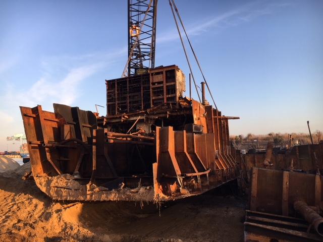 6 February image of the starboard side of Auxiliary Machinery Room being lifted free of the beach. The project team continued to move steel rapidly as the project nears completion.