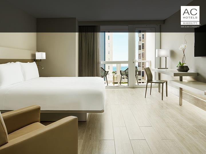 GUESTROOMS Contemporary European-style guest room featuring classic modern furnishings and thoughtful decor.