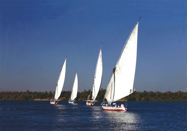 Upon arrival in Aswan at approximately 1pm we board our wind-powered Nile felucca for a 2-night voyage on the River Nile downstream to Daraw and onward by road to Kom Ombo.