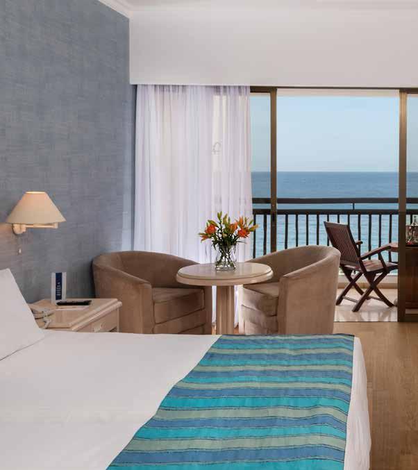 CORAL BEACH HOTEL & RESORT CORAL BAY - PAPHOS All Inclusive Option Golf Nearby Situated on 500 metres of natural sandy beach with its own private harbour, is the Coral Hotel and Resort.