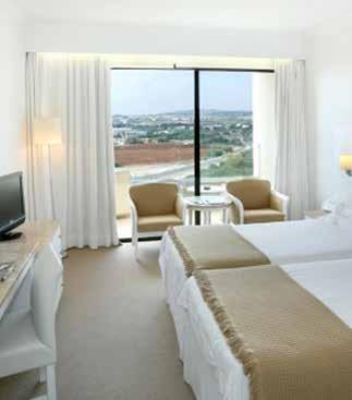 Standard Room GRECIAN PARK HOTEL PROTARAS The Grecian Park Hotel is set on a hillside overlooking Cape Greco, with a secluded sandy beach below.