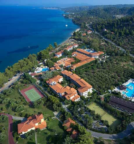 The resort benefits from a spectacular location on the southern tip of the Kassandra peninsula in Halkidiki and directly on a secluded bay with a long stretch of white sandy-pebbled beach, the