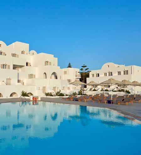 Set on a cliff-top with views across to the small volcanic islands of Palea, Nea and Thirassia, the hotel is a complex of traditionallystyled whitewashed buildings.