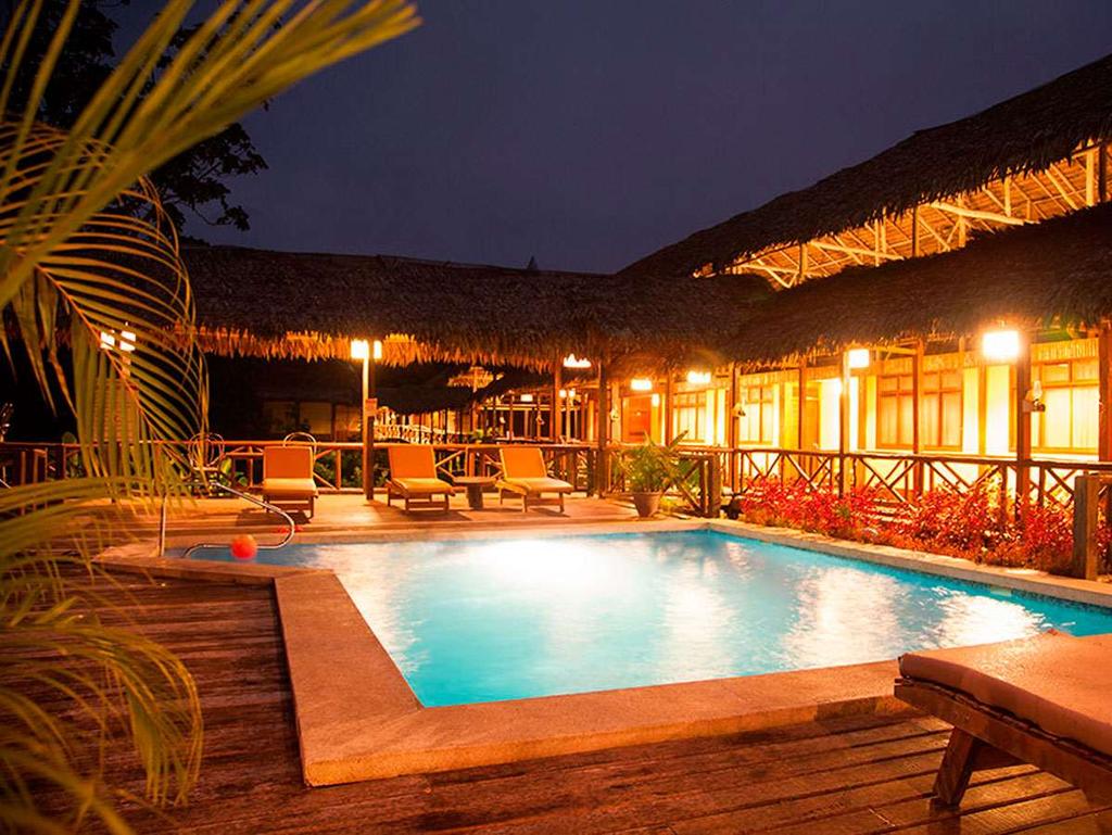Stay at an ecosensitive, limited electricity lodge built by the local host community in a complex of 14 rustic clusters of native style
