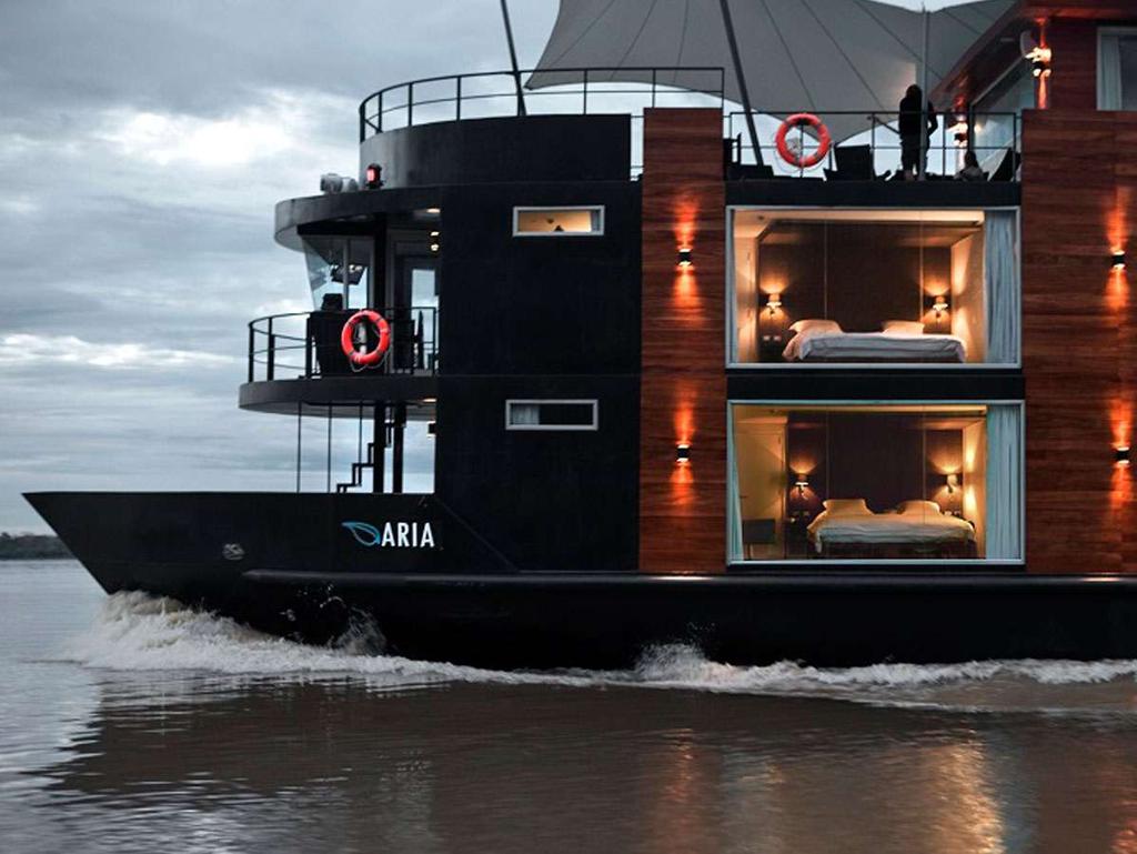 ARIA LUXURY AMAZON RIVER CRUISE 32 Passengers CABINS: 16 suites 8 Design Suites on first deck.