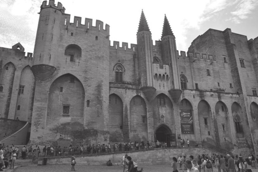 6 7 Figure 2 is a photograph of the Palais des Papes in Avignon. Avignon is a popular short-haul travel destination in France.