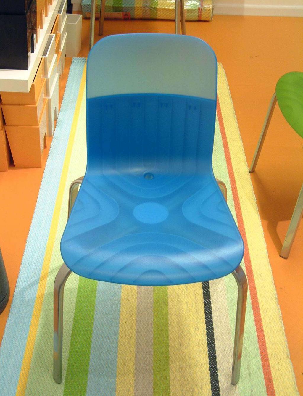 3 A modern looking chair in two materials. Notice the pattern and translucent effect of the seat allows you to see the positioning of the legs underneath.