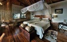 Xugana Island Lodge, situated on a wooded island abutting the lagoon, takes full advantage of this magnificent site.