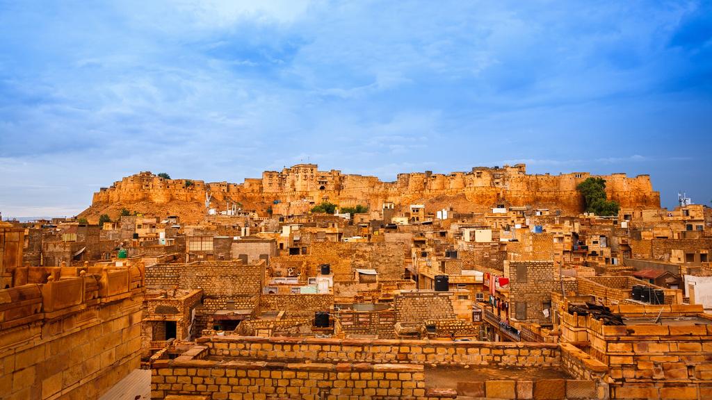 Journeying by train and private car, you will leave the Mughal and Raj monuments of Delhi behind and travel across the Thar Desert to Jaisalmer, where you will camp amongst the golden desert dunes.
