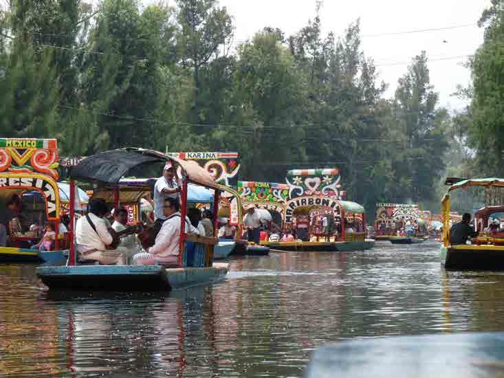 These canals, along with artificial islands called chinampas, attract city residents to ride on colourful gondola-like boats called trajineras around the 170km of canals.