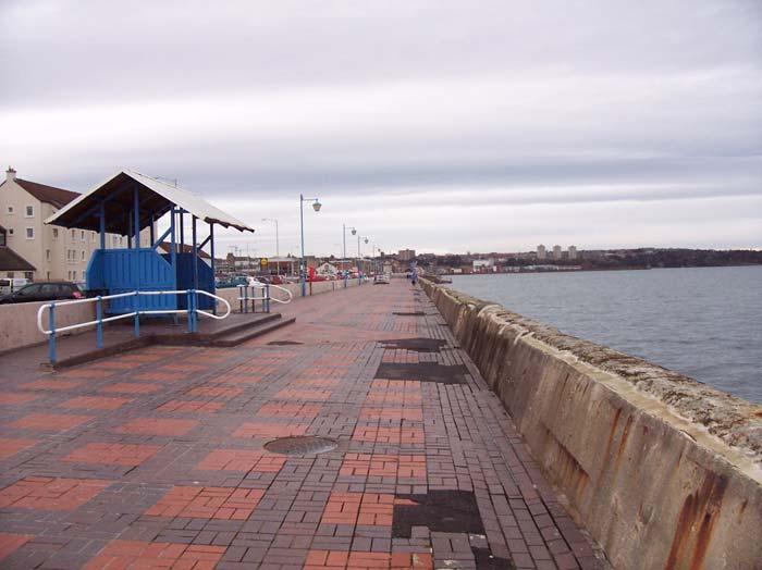 The local environmental context of the project is shown in Figure 4.2. The A921 Esplanade provides access along the coast but physically separates the town from the promenade, sea and shore.