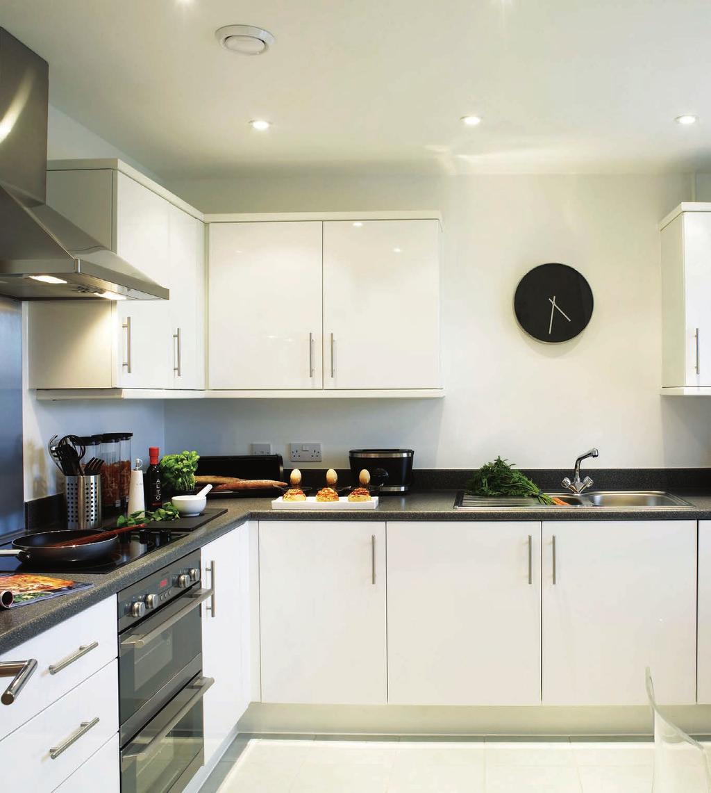 A SPECIFICATION THAT S stylish and contemporary KITCHEN FOR HOUSES Multifunctional AEG double or single oven AEG appliances including: Gas hob Stainless steel chimney hood Stainless steel splash back