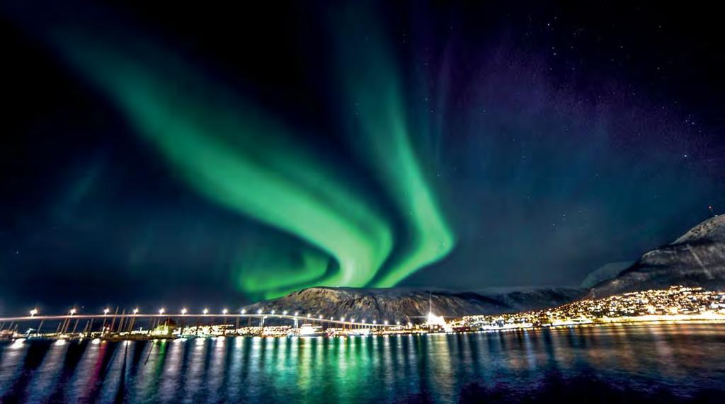 enlighten Located in northern Norway, the city of Tromsø sits right above the Arctic Circle.