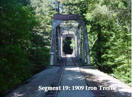 The trail bridge structure would not have to reach the same elevation as the adjacent railroad structure, if conditions allowed the trail to gradually drop and climb back up to the elevation of the