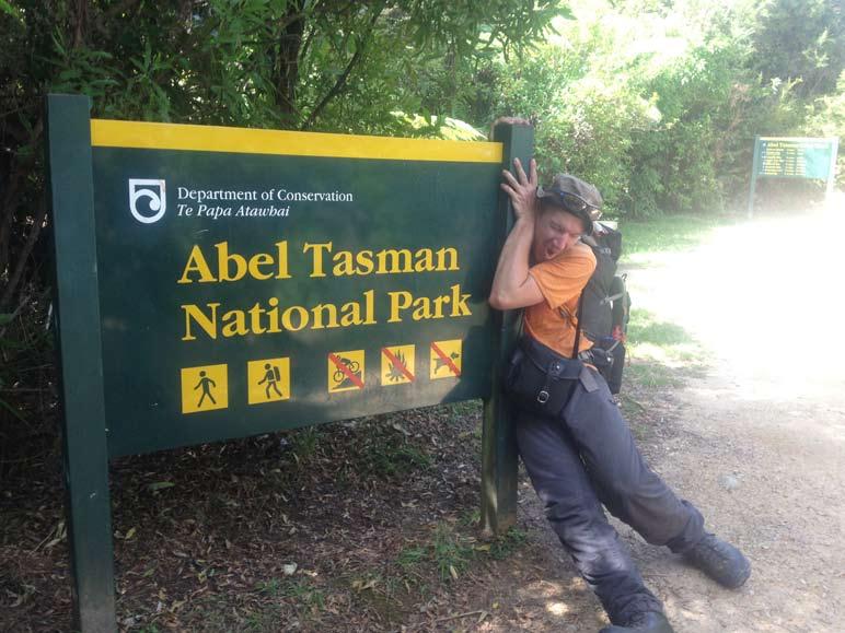This is my friend Andy clowning around at the finish of the Abel Tasman Coastal Track.