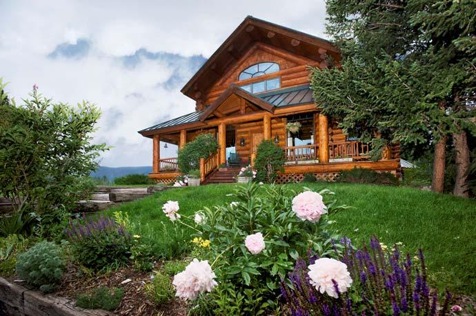 ACREAGE & DESCRIPTION This 6,450 square foot quintessential log home sits alongside of the picturesque Sawmill Meadow on 70 acres with breath taking views of the Sleeping Indian Mountain, Eagles Nest