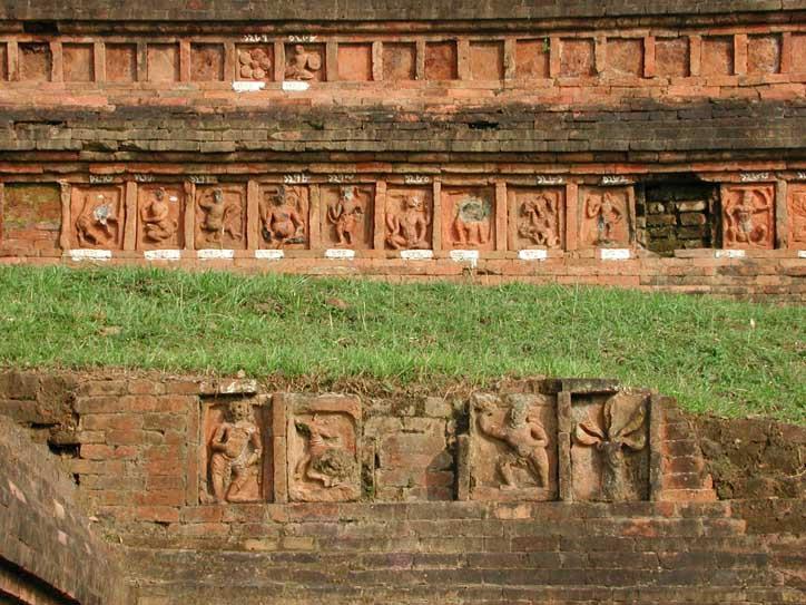 At the intermediate level there were originally two bands of terracotta plaques running around the full perimeter of the shrine, out of which half are still preserved in situ.