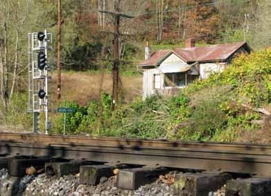 Along the N&W in the 21 st Century Color position lights were still in service when Ed Painter photographed a westbound freight at Oakvale, West Virginia, on October 25, 2012.