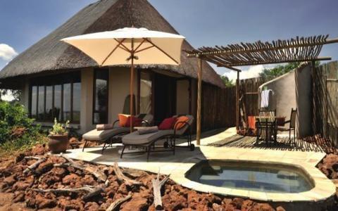 The lodge incorporates rustic and ethnic styles, with natural finishes and an emphasis on space and
