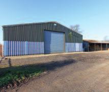 Provides approximately 700 tons of grain storage. 2 19.6m x 6.1m Open fronted brick and stone cart shed under a slate roof. 3 18.3m x 7.