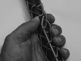 As you would lace a shoe, criss-cross the lace strands and thread them through the next two loops.