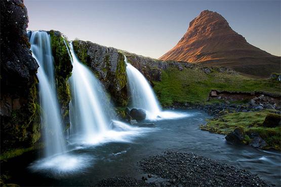 Day 12: Snæfellsnes, Iceland The famous Snæfellsjökull volcano and picturesque Kirkjufell mountain are dominant features in the impressive landscape of the Snæfellsnes peninsula.