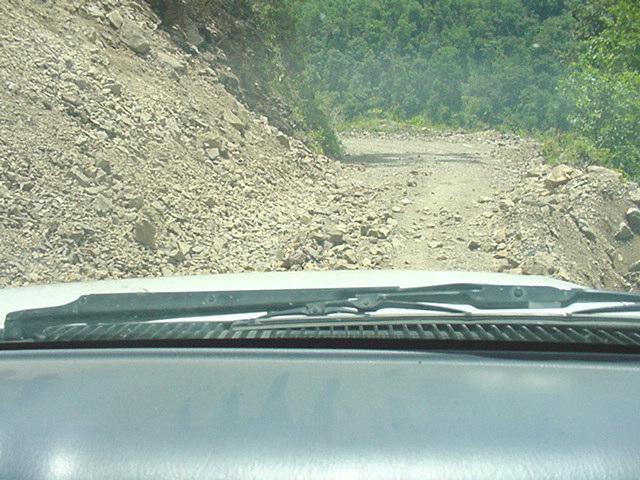Picture No. 31 The landslides make difficult to drive through the road.