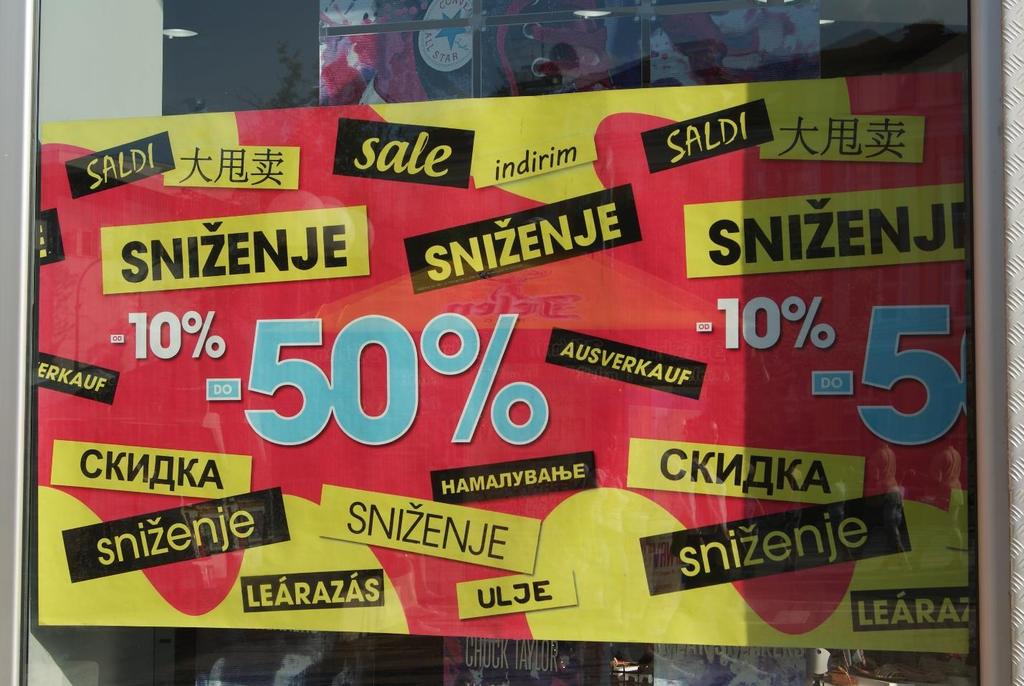 27 Figure 26: A sign announces a sale in various lanuages, including Bosnian, Serbain, and English.